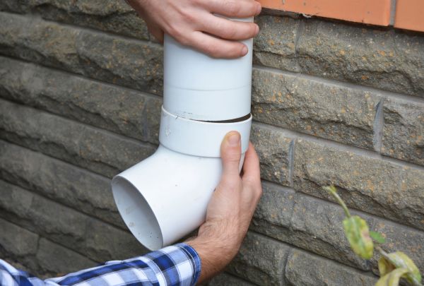 Drainage Downspout Repair in Edmond